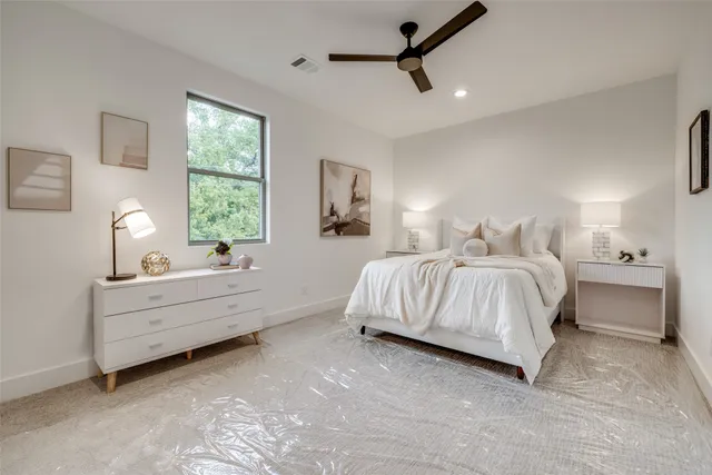 a view of a swimming pool with a lounge chairs