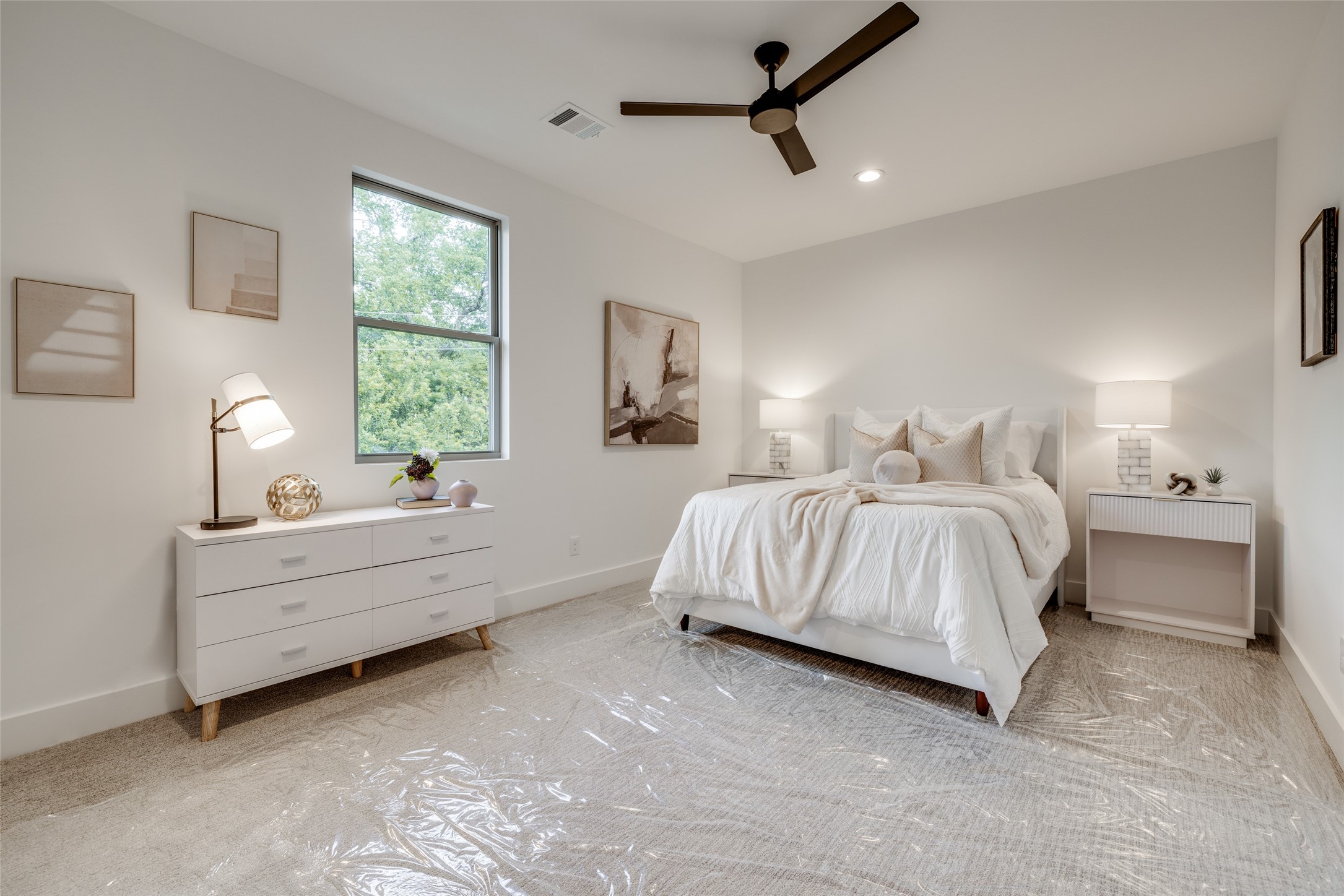 2325 Richton Street Houston, TX 77098 - Photo 44 of 47 a spacious bedroom with a bed and a window