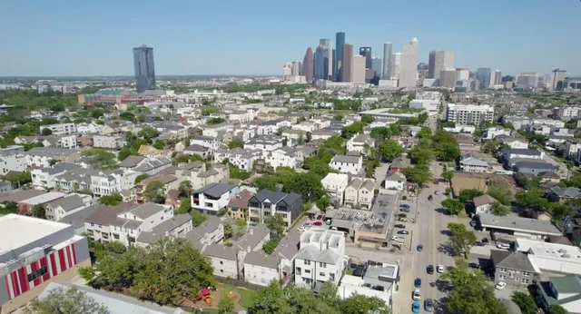 a kitchen with kitchen island a sink stainless steel appliances and cabinets