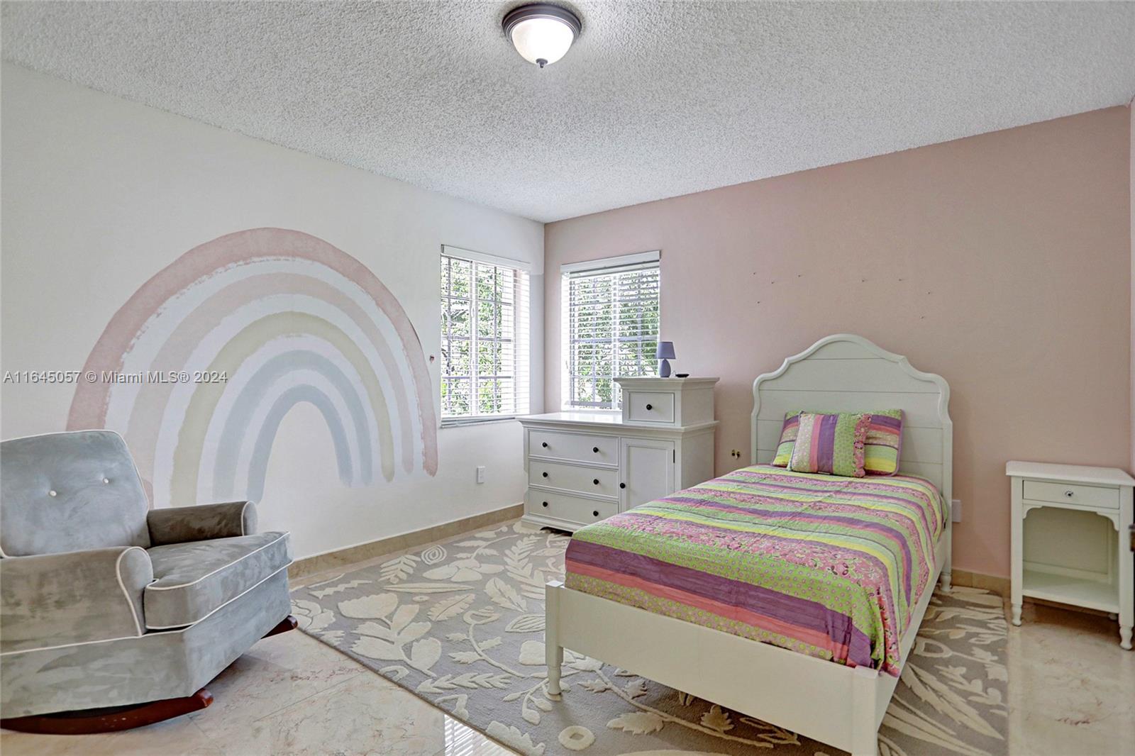 15591 Southwest 42nd Lane Miami, FL 33185 - Photo 27 of 60 a bedroom with a bed and a large window