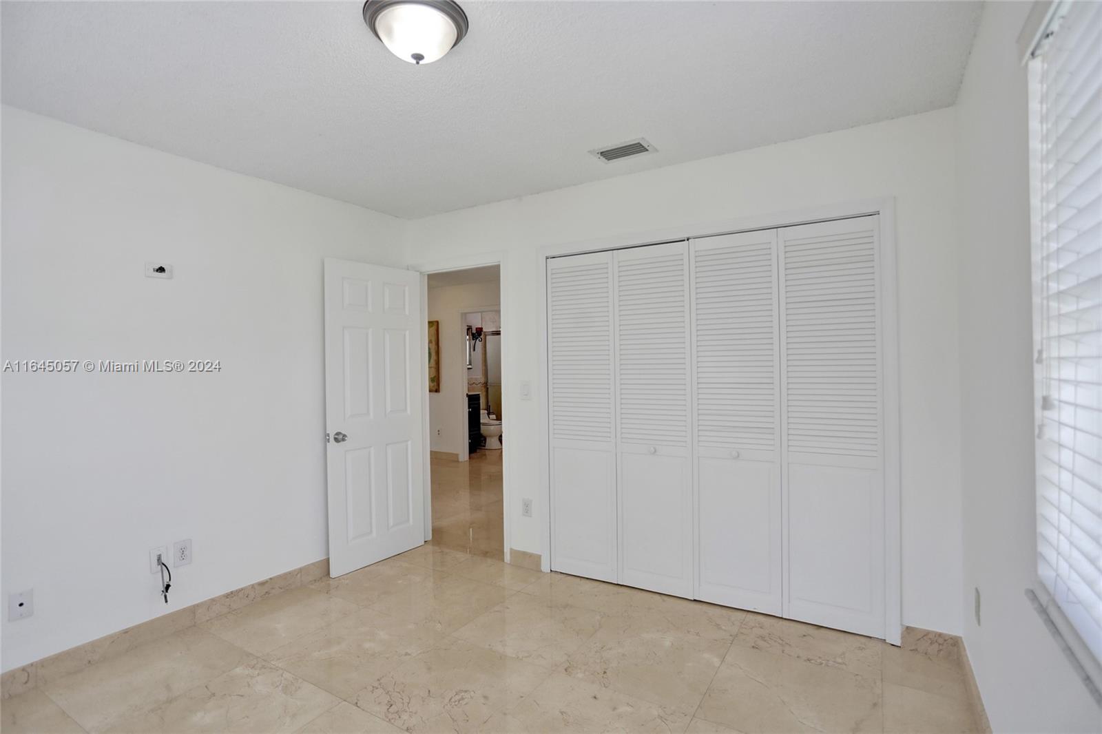 15591 Southwest 42nd Lane Miami, FL 33185 - Photo 35 of 60 a view of an empty room