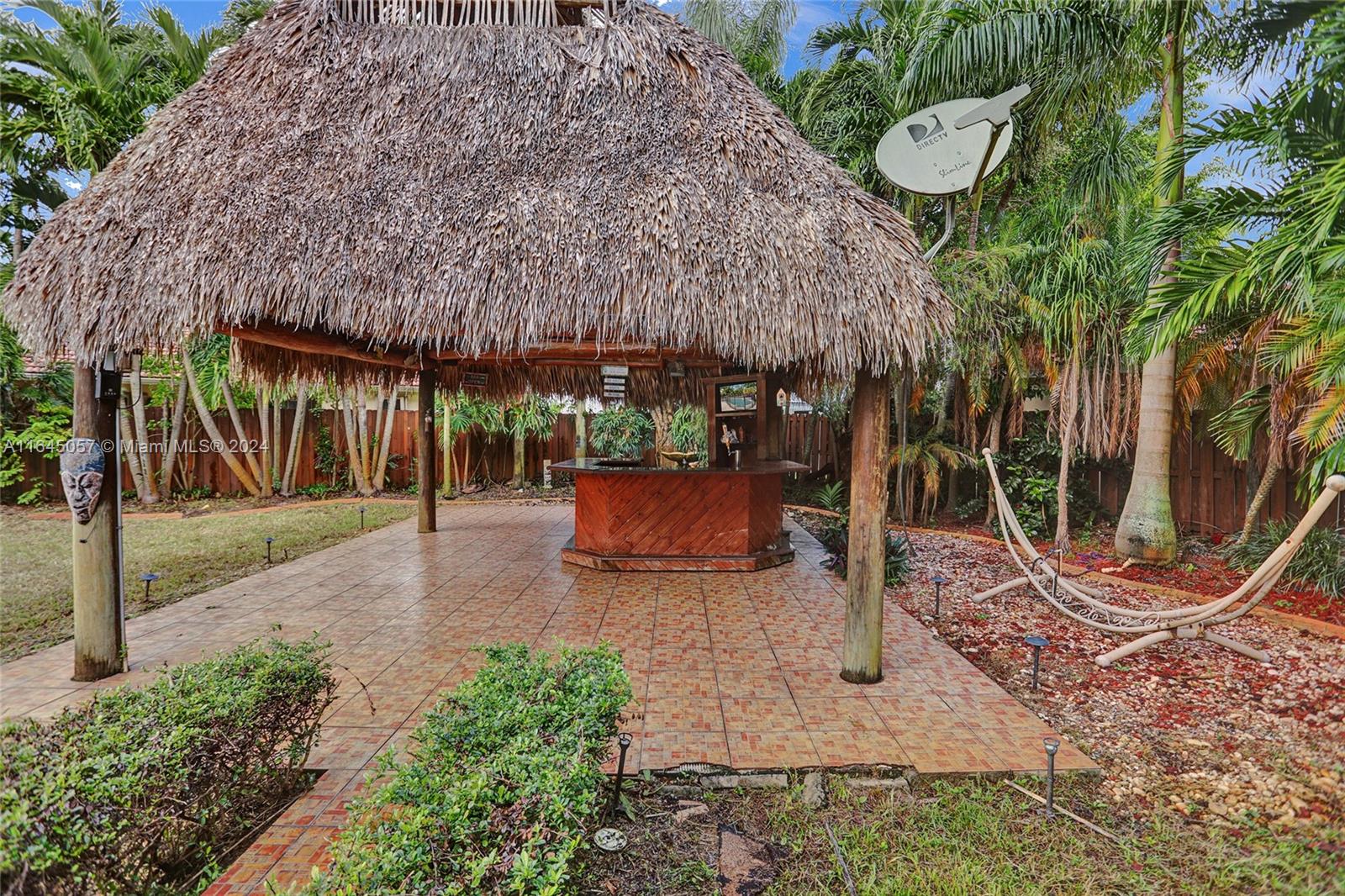 15591 Southwest 42nd Lane Miami, FL 33185 - Photo 47 of 60 a view of a backyard with plants