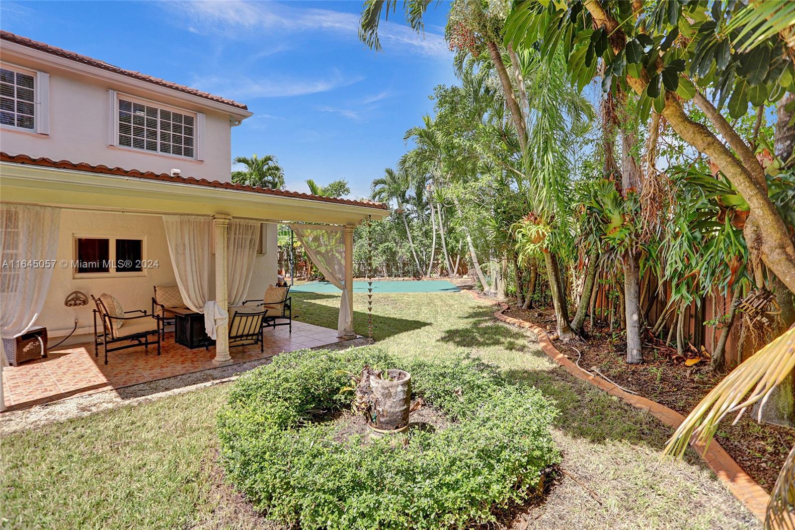 15591 Southwest 42nd Lane Miami, FL 33185 - Photo 50 of 60 a view of a backyard with sitting area
