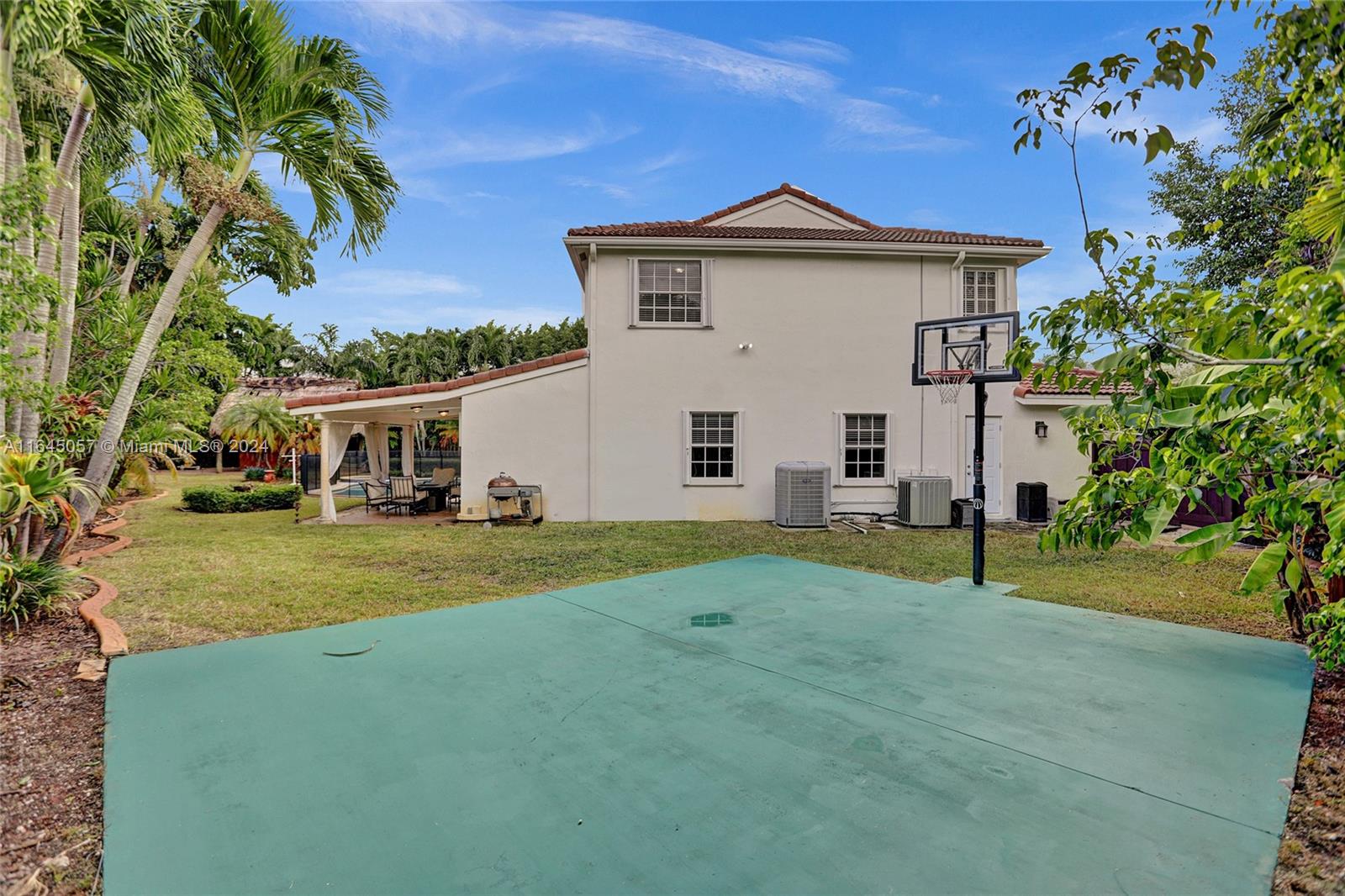15591 Southwest 42nd Lane Miami, FL 33185 - Photo 51 of 60 a view of a house with a yard