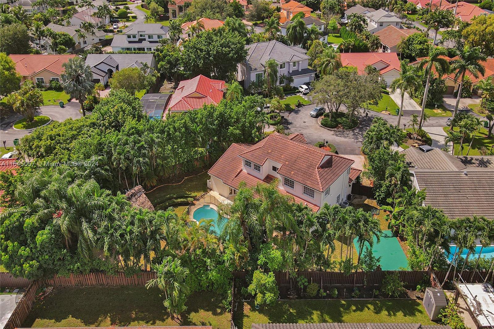 15591 Southwest 42nd Lane Miami, FL 33185 - Photo 52 of 60 an aerial view of residential house with outdoor space and swimming pool