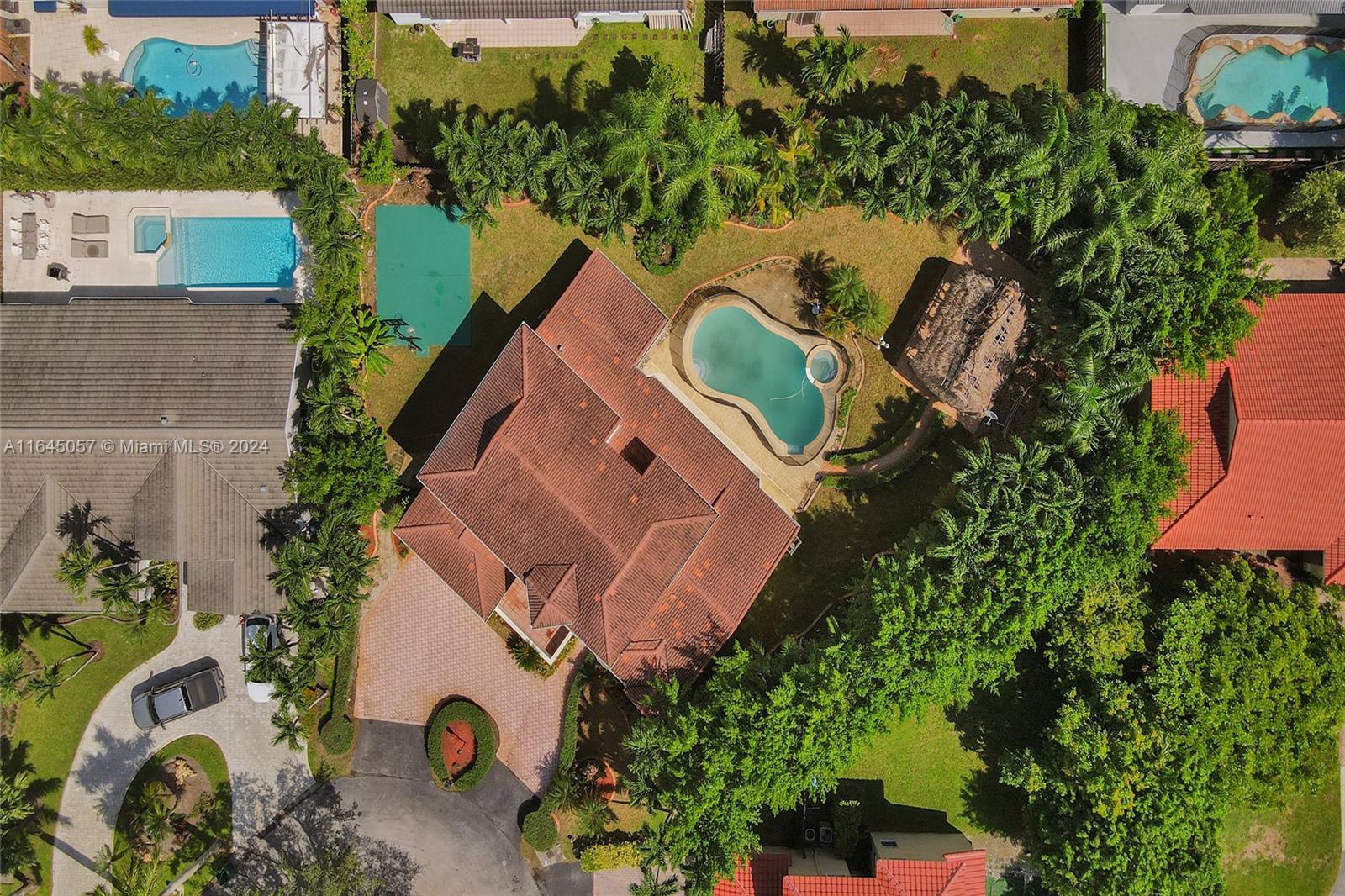 15591 Southwest 42nd Lane Miami, FL 33185 - Photo 54 of 60 an aerial view of a house with a swimming pool