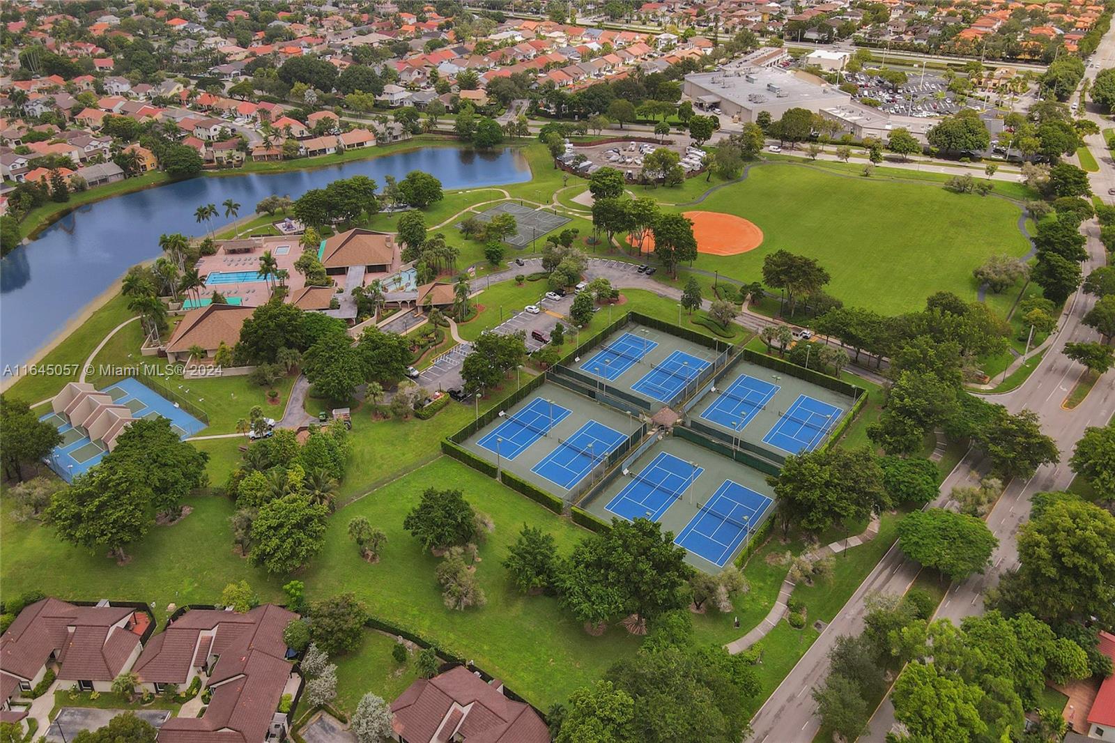 15591 Southwest 42nd Lane Miami, FL 33185 - Photo 58 of 60 an aerial view of a house with a lake view