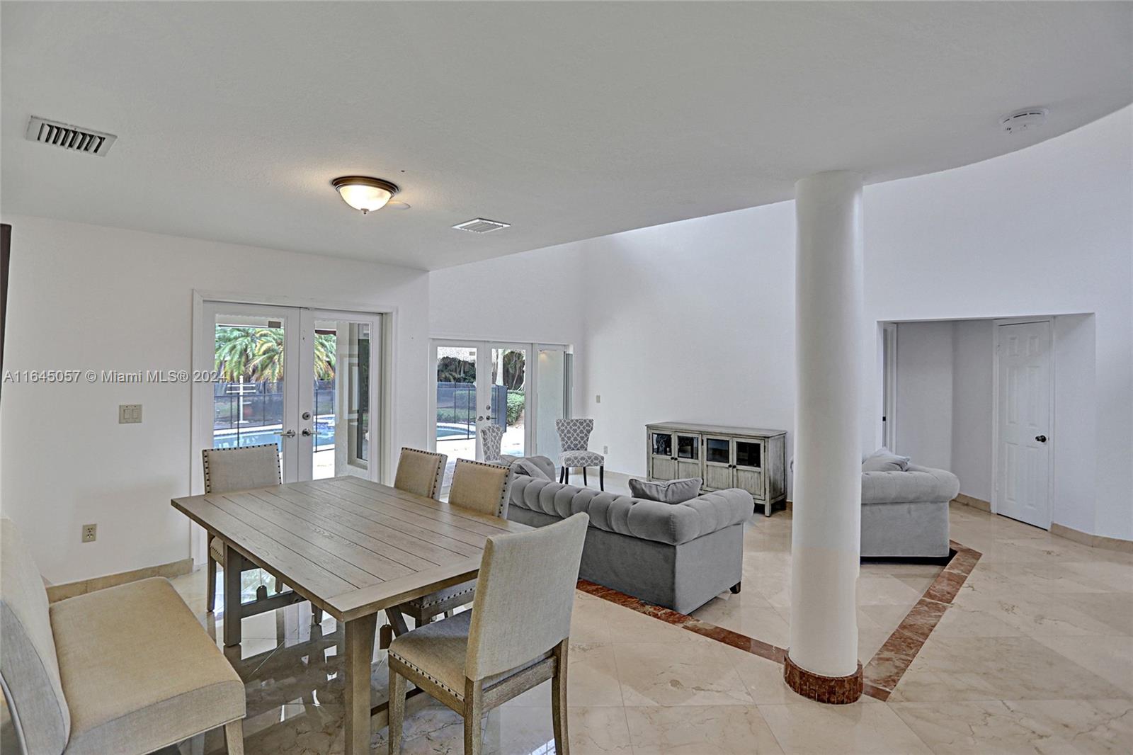 15591 Southwest 42nd Lane Miami, FL 33185 - Photo 7 of 60 a view of a dining room with furniture