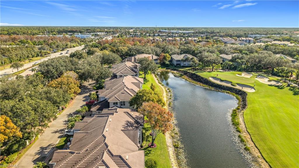 3051 Lancaster Drive, Unit 2 Naples, FL 34105 - Photo 38 of 43 an aerial view of residential houses with outdoor space