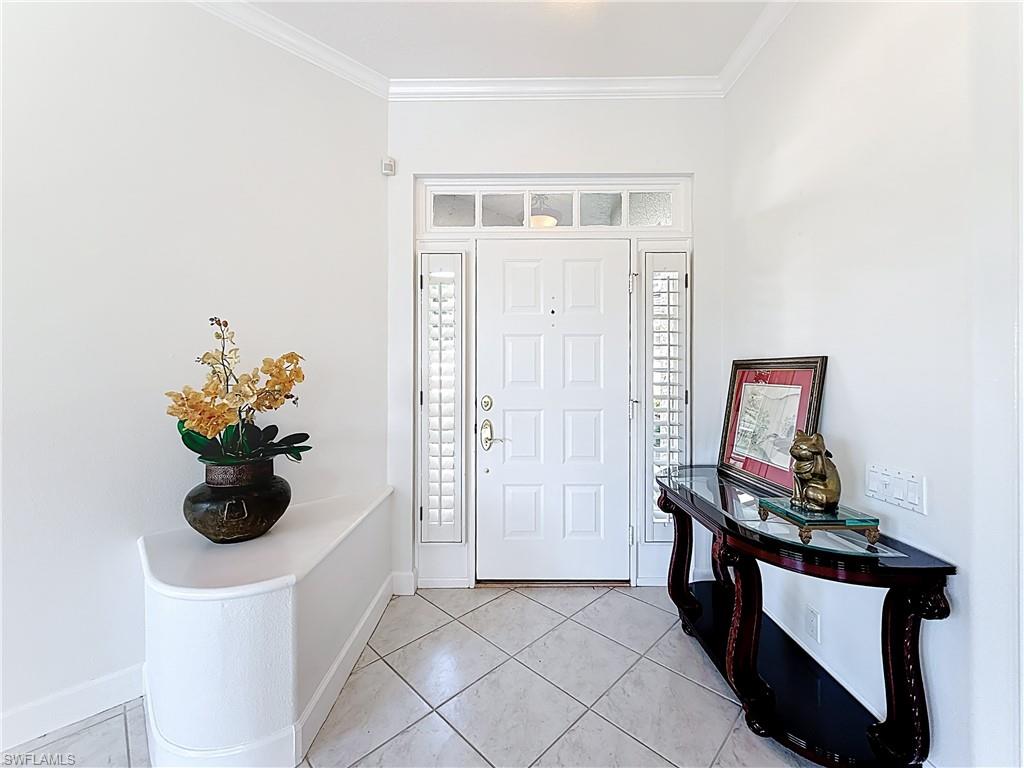 3051 Lancaster Drive, Unit 2 Naples, FL 34105 - Photo 5 of 43 a view of a hallway with workspace