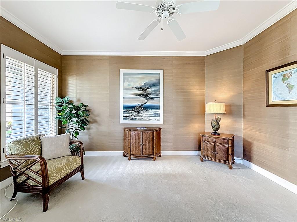 3051 Lancaster Drive, Unit 2 Naples, FL 34105 - Photo 7 of 43 a living room with furniture and a window