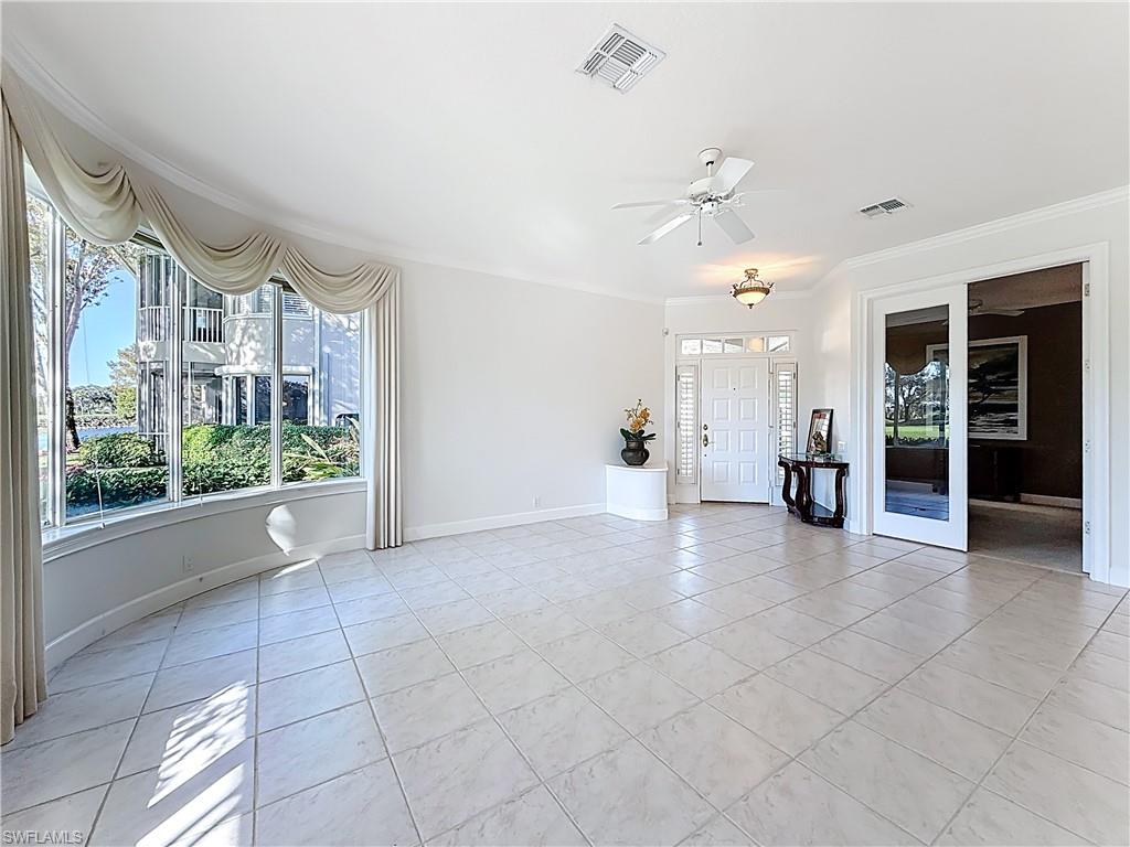 3051 Lancaster Drive, Unit 2 Naples, FL 34105 - Photo 9 of 43 a view of livingroom with furniture and windows