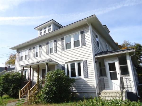 2005-2007 Palmer Road Three Rivers, MA 01080 - Photo 1 of 14 a front view of a house with plants