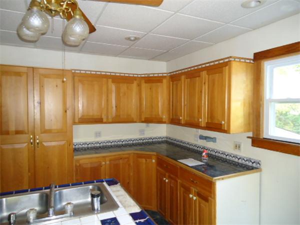 2005-2007 Palmer Road Three Rivers, MA 01080 - Photo 3 of 14 a kitchen with a sink and cabinets