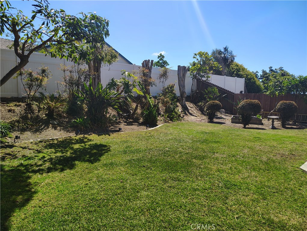 398 Day Road Ventura, CA 93003 - Photo 58 of 69 a view of a house with a yard and sitting area