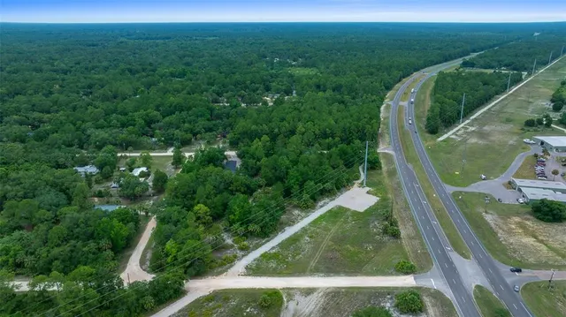 a view of a yard from a balcony