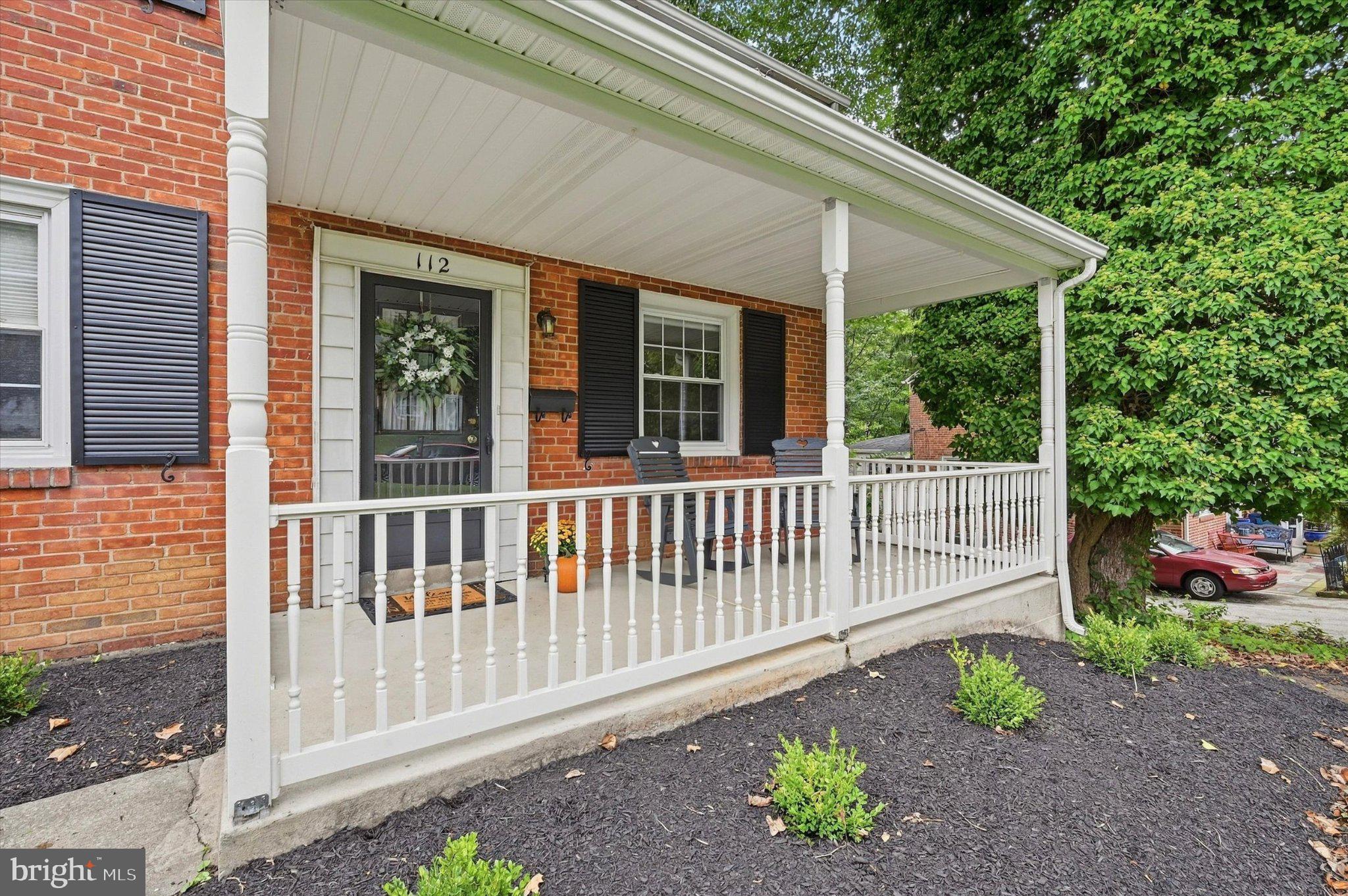 112 Ashwood Road Springfield, PA 19064 - Photo 4 of 35 Welcoming front Porch with Rockers