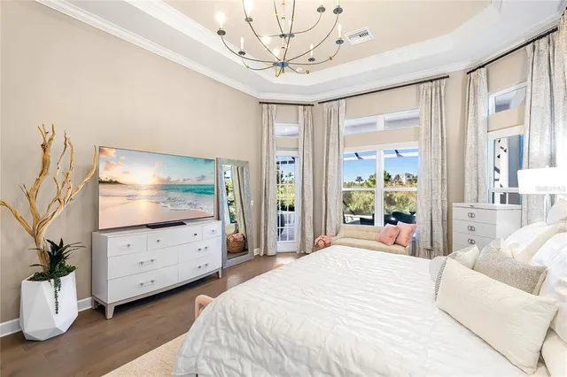 a bedroom with a bed and a mirror