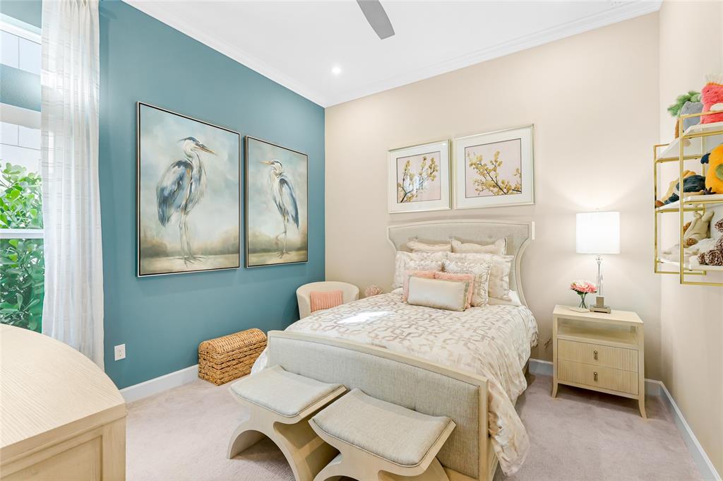 8232 Summer Night Road Sarasota, FL 34241 - Photo 21 of 82 a bedroom with a bed and a painting on the wall