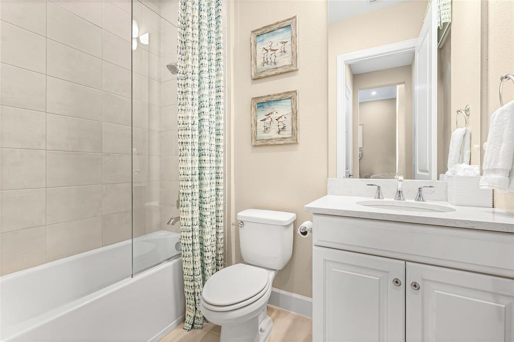 8232 Summer Night Road Sarasota, FL 34241 - Photo 24 of 82 a bathroom with a sink toilet and shower