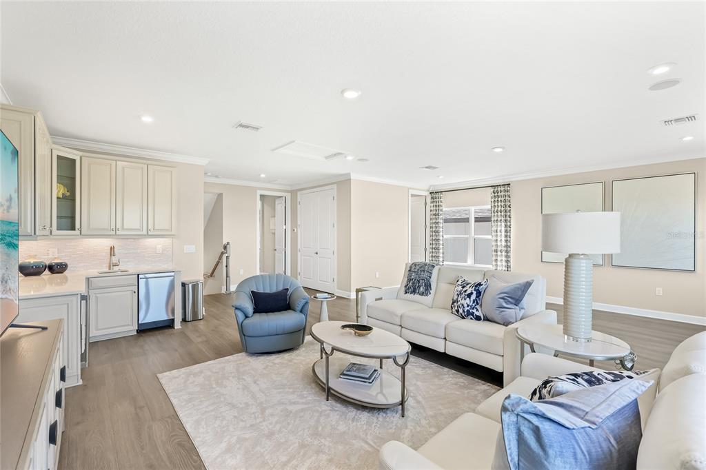 8232 Summer Night Road Sarasota, FL 34241 - Photo 32 of 82 a living room with furniture and a large window