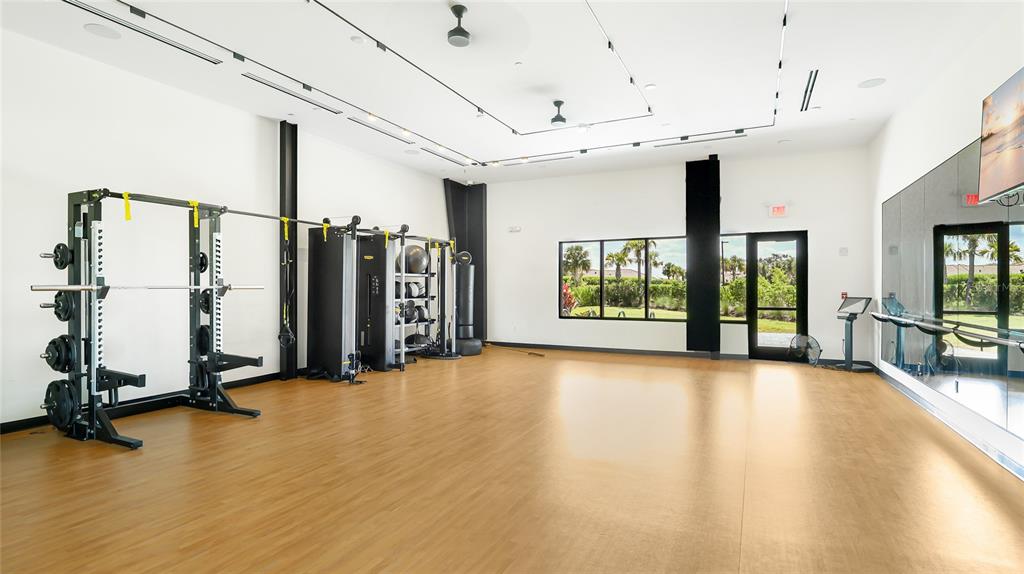 8232 Summer Night Road Sarasota, FL 34241 - Photo 63 of 82 a view of an empty room with windows