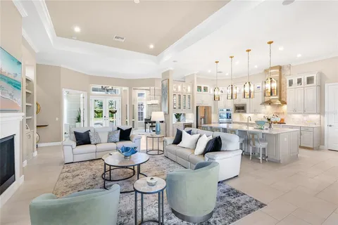 a kitchen with stainless steel appliances a sink a counter top space appliances and cabinets