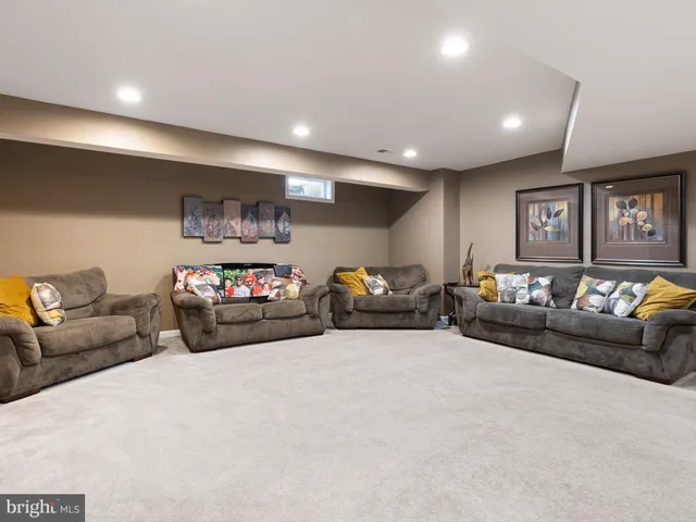 a living room with furniture and a couch