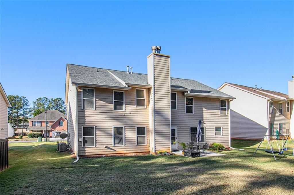 550 Windsor Way Fairburn, GA 30213 - Photo 26 of 28 a front view of a house with a yard