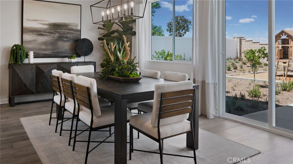 2395 Huron Road Rialto, CA 92377 - Photo 5 of 17 a view of a dining room with furniture and chandelier