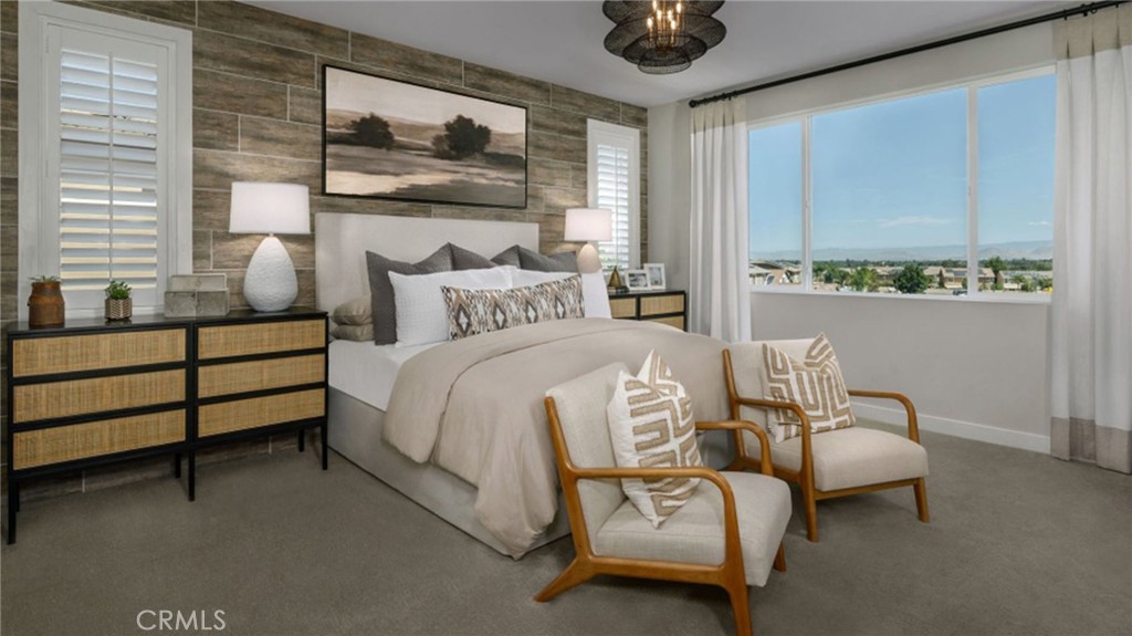 2395 Huron Road Rialto, CA 92377 - Photo 8 of 17 a bedroom with furniture and a large window