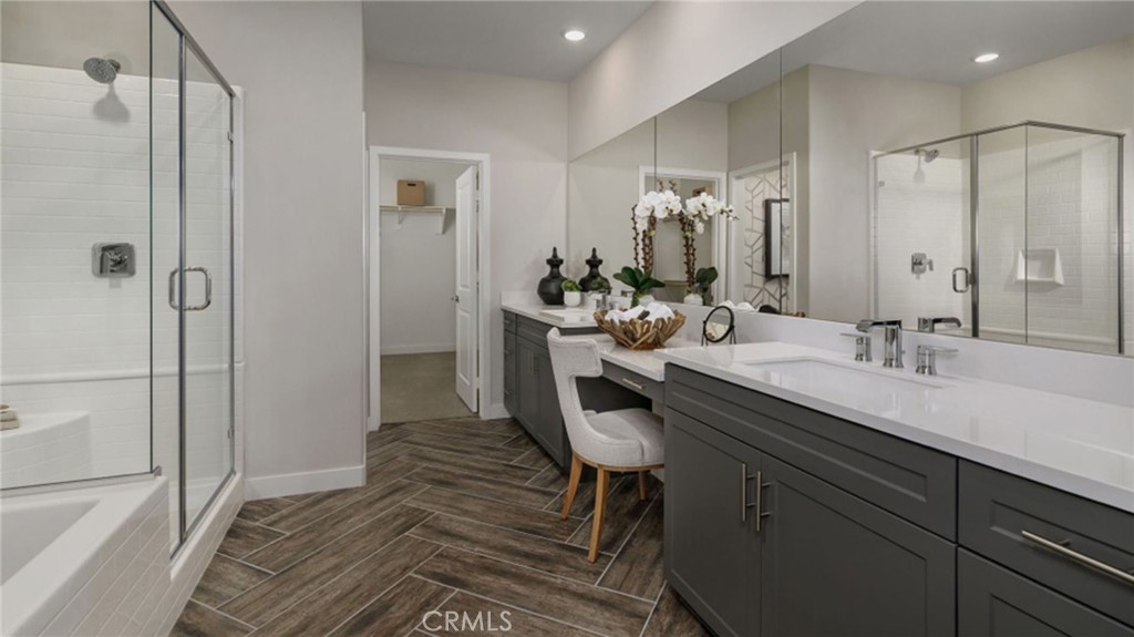 2395 Huron Road Rialto, CA 92377 - Photo 9 of 17 a bathroom with a sink a toilet and shower