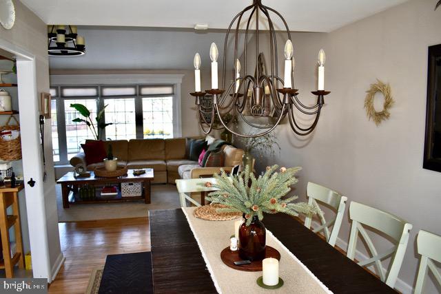 9203 Burbank Road Philadelphia, PA 19115 - Photo 27 of 62 a living room with furniture and a chandelier