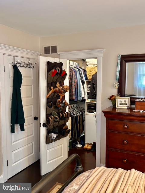 9203 Burbank Road Philadelphia, PA 19115 - Photo 46 of 62 a bedroom with a bed and a mirror