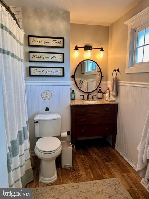 9203 Burbank Road Philadelphia, PA 19115 - Photo 49 of 62 a bathroom with a toilet and a mirror