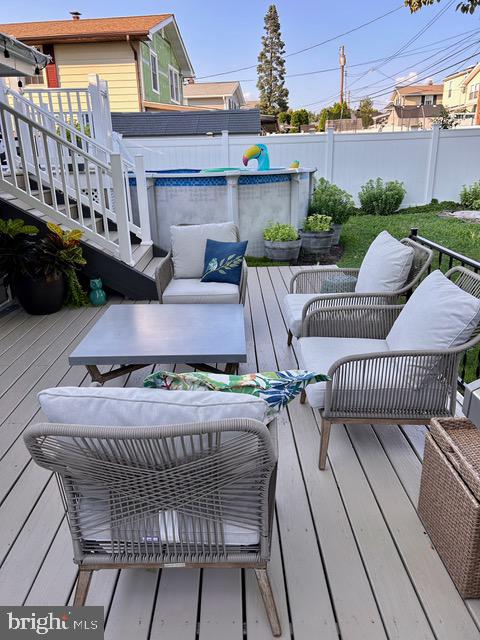 9203 Burbank Road Philadelphia, PA 19115 - Photo 52 of 62 a view of a patio with couches chairs and wooden floor