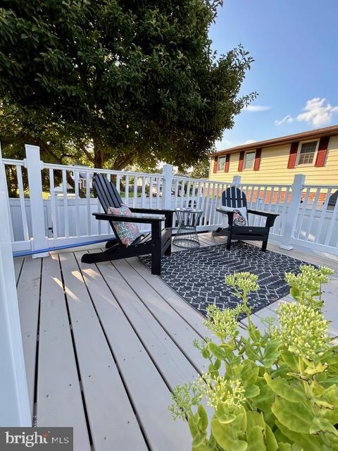 9203 Burbank Road Philadelphia, PA 19115 - Photo 56 of 62 a view of a patio with table and chairs and potted plants