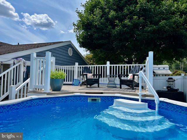 9203 Burbank Road Philadelphia, PA 19115 - Photo 57 of 62 a view of balcony with wooden floor and outdoor seating