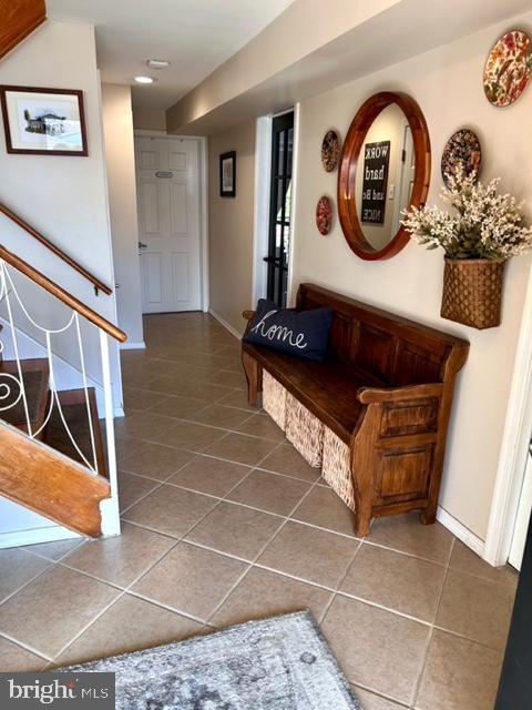 9203 Burbank Road Philadelphia, PA 19115 - Photo 7 of 62 a bathroom with a toilet a mirror and vanity
