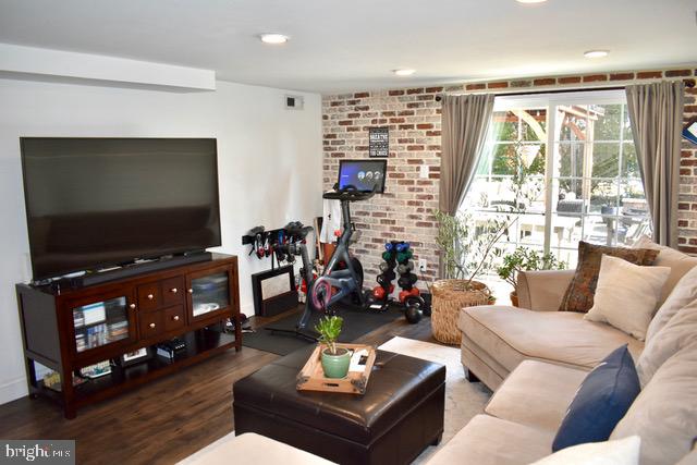 9203 Burbank Road Philadelphia, PA 19115 - Photo 10 of 62 a living room with furniture and a flat screen tv