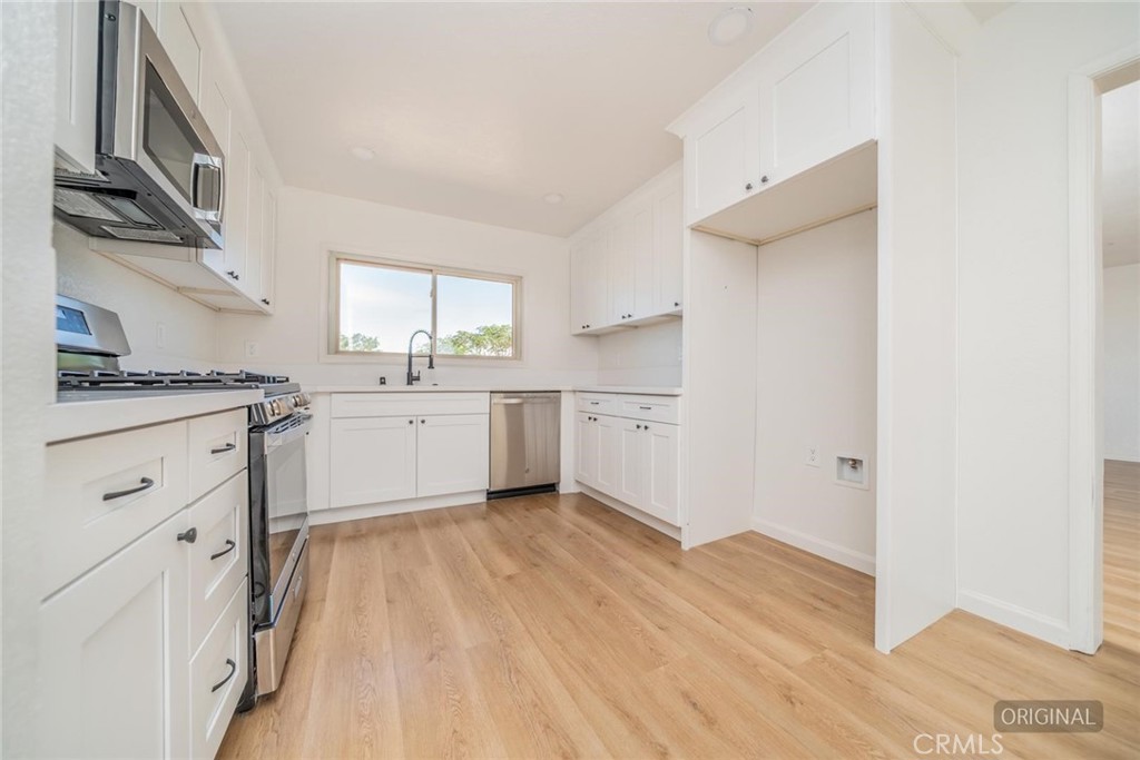 14387 Jicarilla Road Apple Valley, CA 92307 - Photo 9 of 24 Remodeled Kitchen with new stainless appliances