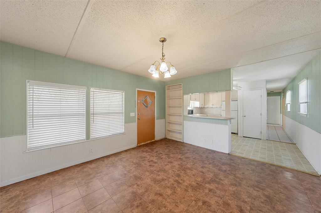 315 Winter Hawk McGregor, TX 76657 - Photo 3 of 15 a view of an empty room with window and cabinet