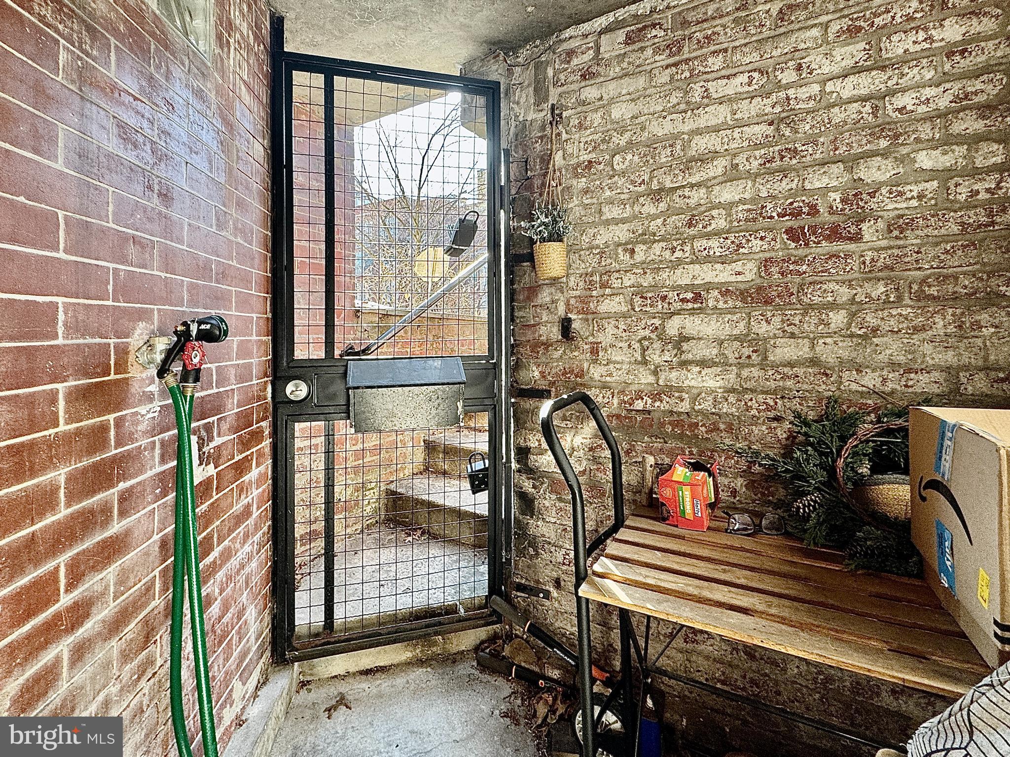 2017 13th Street Northwest, Unit B Washington, DC 20009 - Photo 14 of 15 a view of a balcony with chairs and iron stairs