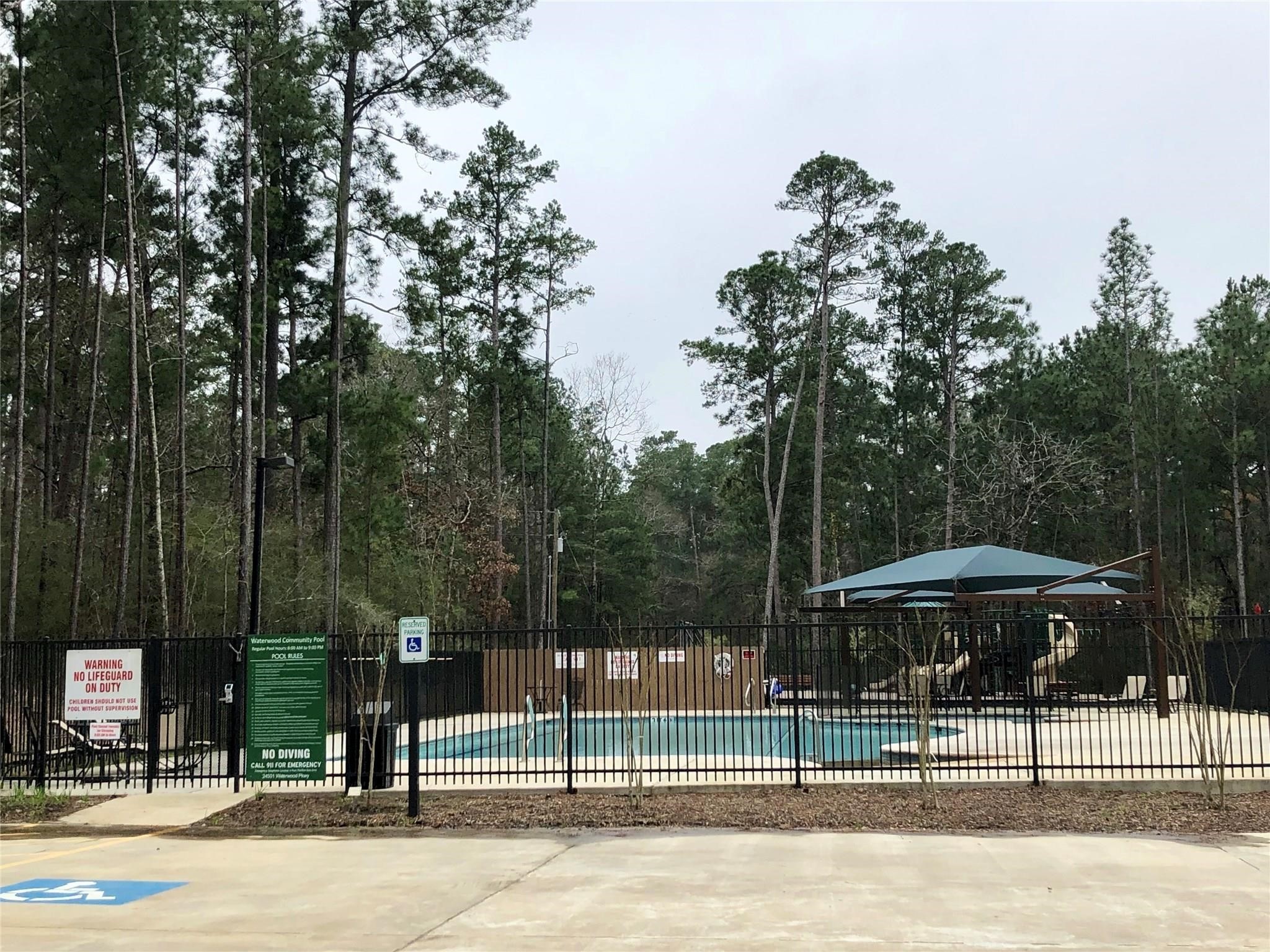 Tbd Tbd Park Point Blank, TX 77364 - Photo 11 of 14 Plenty of parking at the pool area.