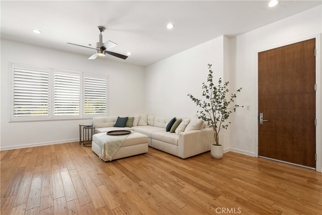 21 Gramercy, Unit 102 Irvine, CA 92612 - Photo 4 of 30 Spacious open concept living area designed for comfortable everyday living and effortless entertaining.