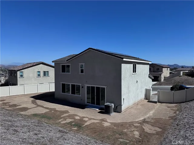 a view of a house with a large window