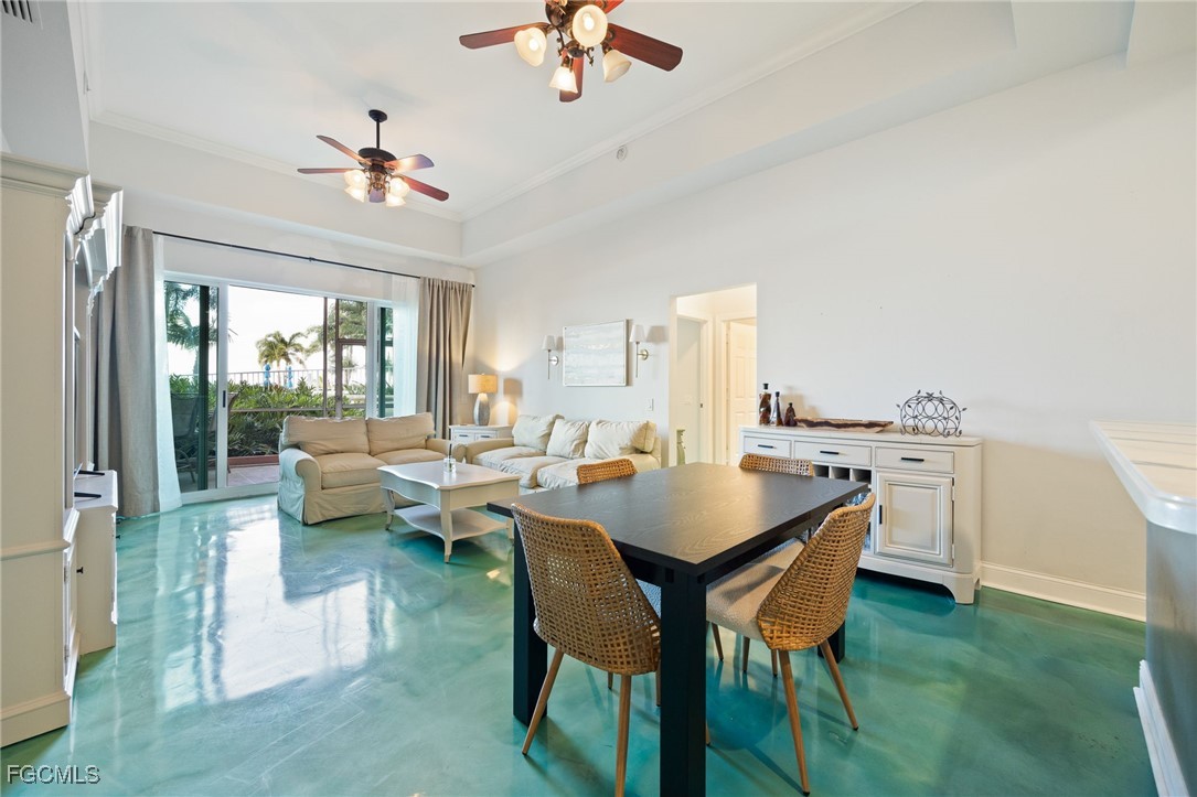 2743 First Street, Unit 304 Fort Myers, FL 33916 - Photo 12 of 50 a view of a dining room with furniture and a livingroom