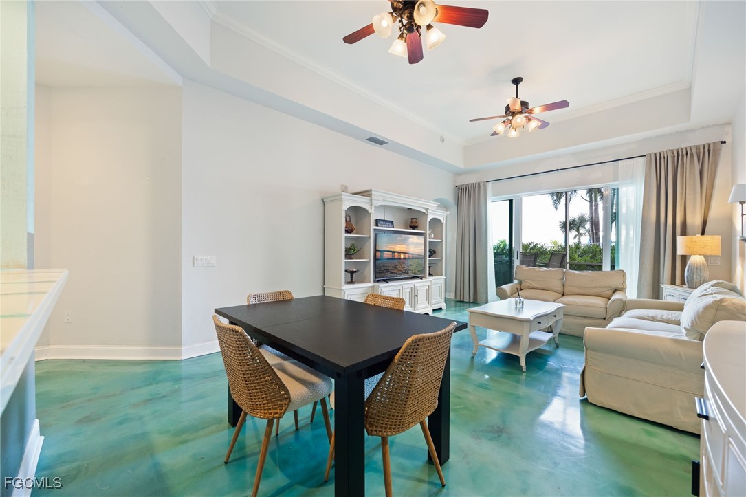 2743 First Street, Unit 304 Fort Myers, FL 33916 - Photo 13 of 50 a view of a livingroom with furniture window and wooden floor