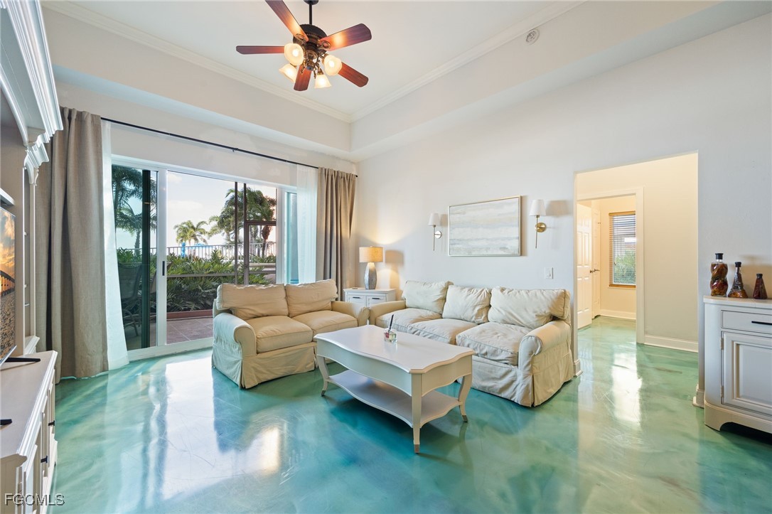 2743 First Street, Unit 304 Fort Myers, FL 33916 - Photo 15 of 50 a living room with furniture and a large window