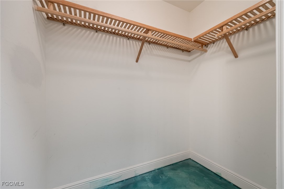 2743 First Street, Unit 304 Fort Myers, FL 33916 - Photo 23 of 50 a view of a room with racks on the wall
